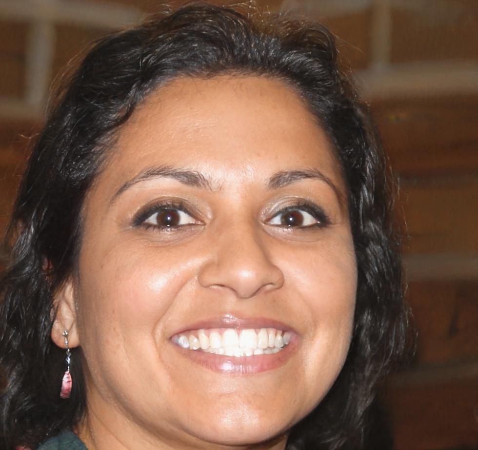 Professional headshot of financial education expert